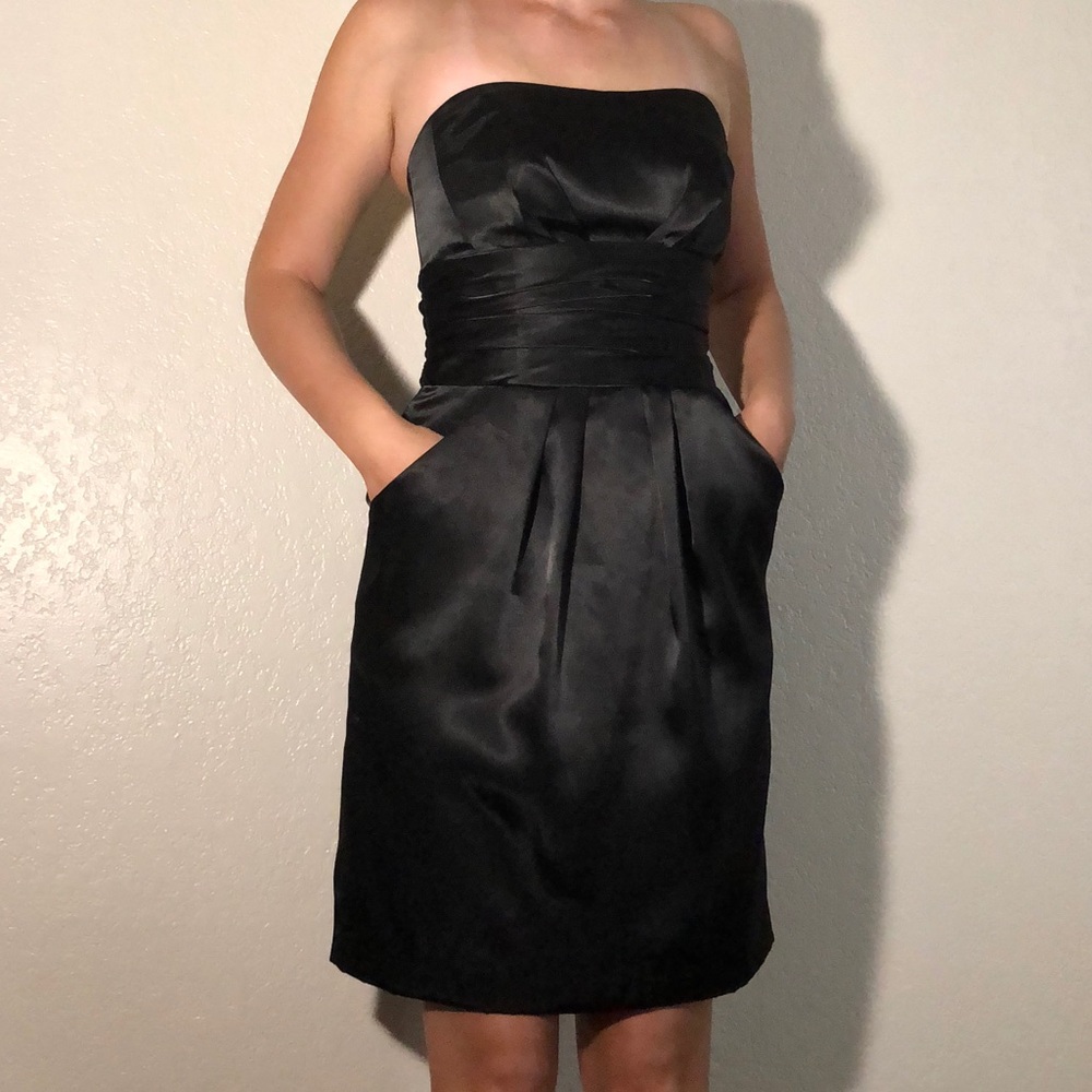 Black strapless knee length dress with pockets